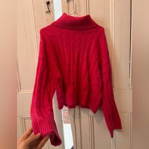 Pink turtleneck sweater